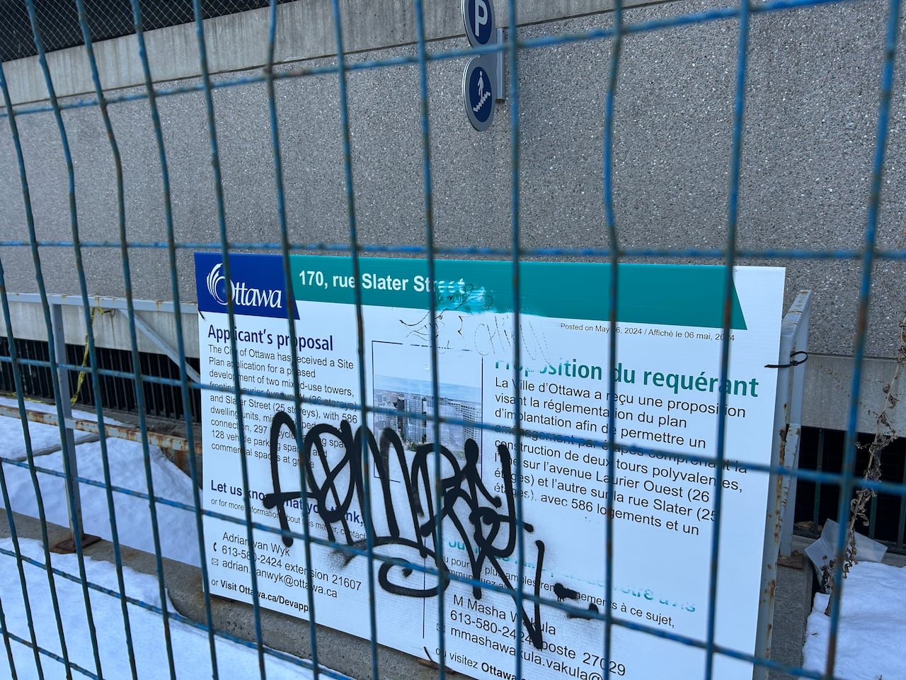 sign announcing development plans