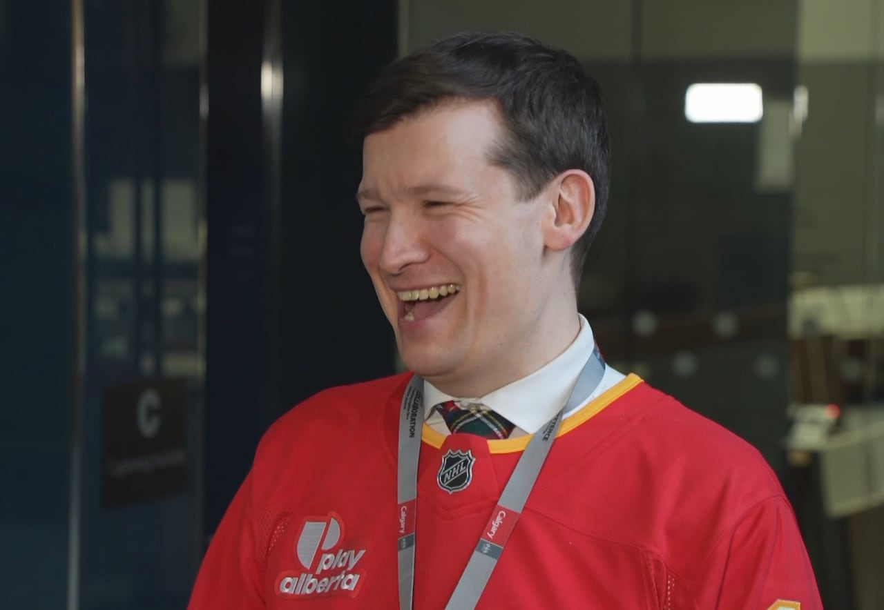 A man in a red jersey.