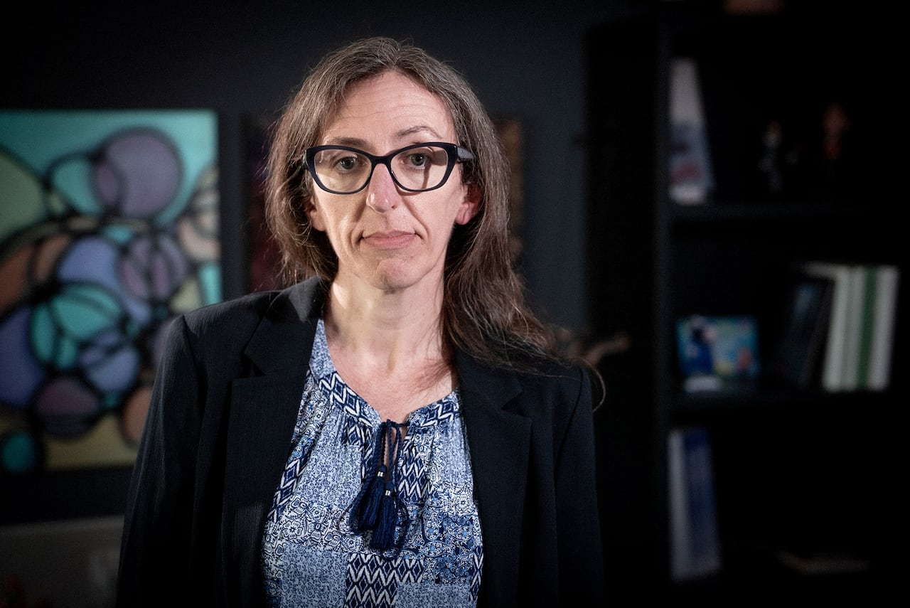 A woman with glasses.