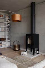 This home has an L-shaped layout that separates the private and public spaces of the home.