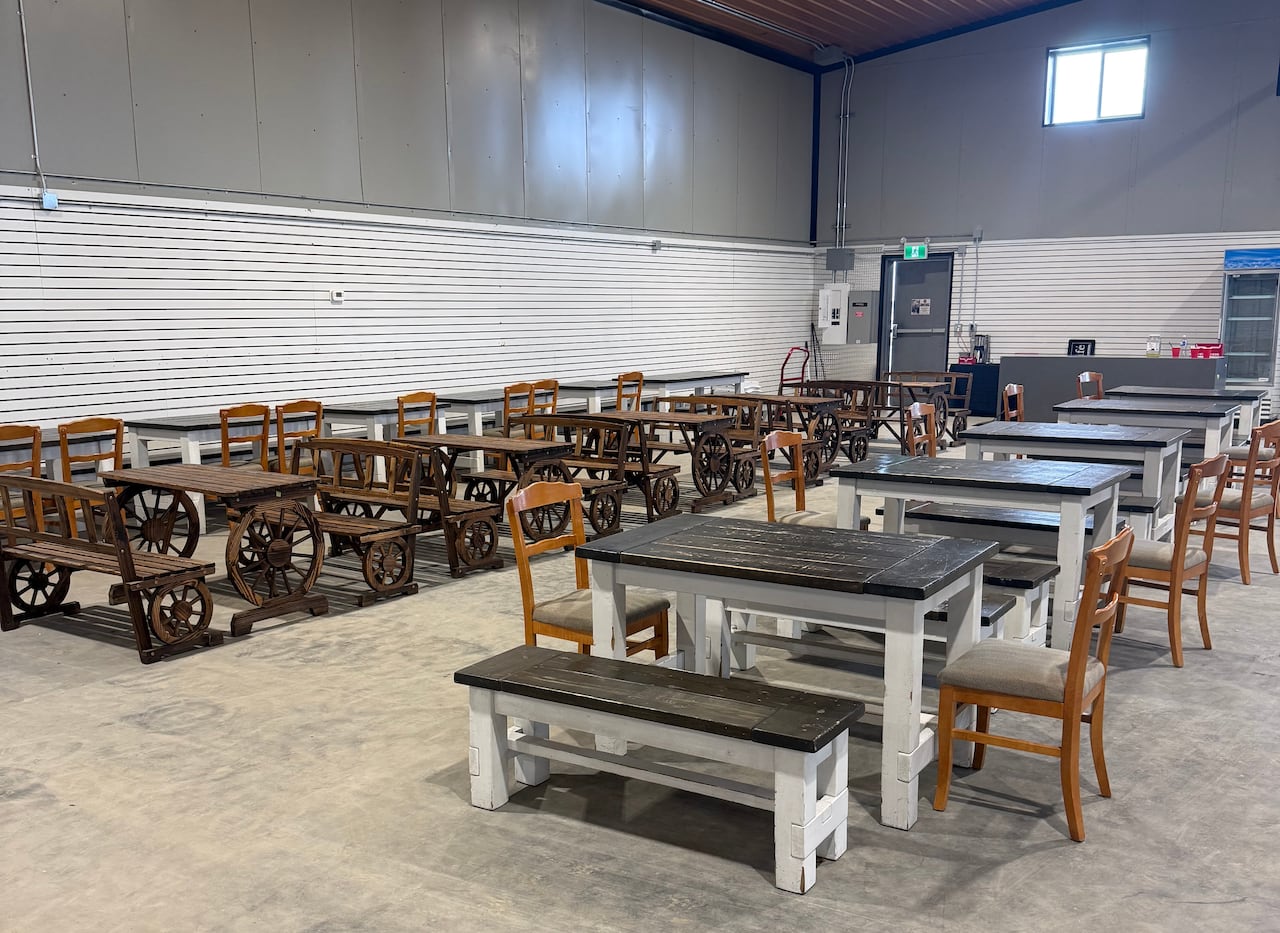 Dining tables and chairs are pictured in a new location Irvine Tack and Western wear is building.