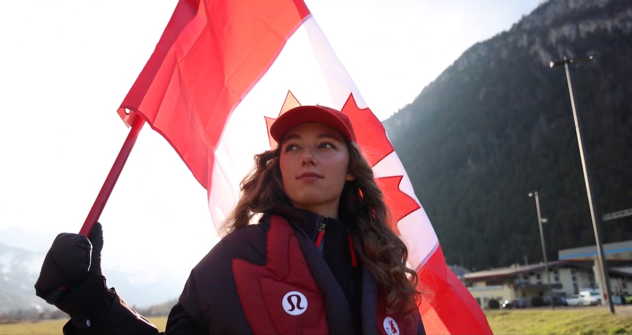 Woman outside with Canadian flag