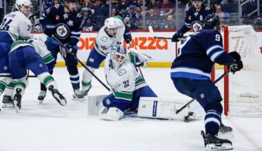 Morrissey's OT goal lifts Jets to 3-2 victory over Canucks