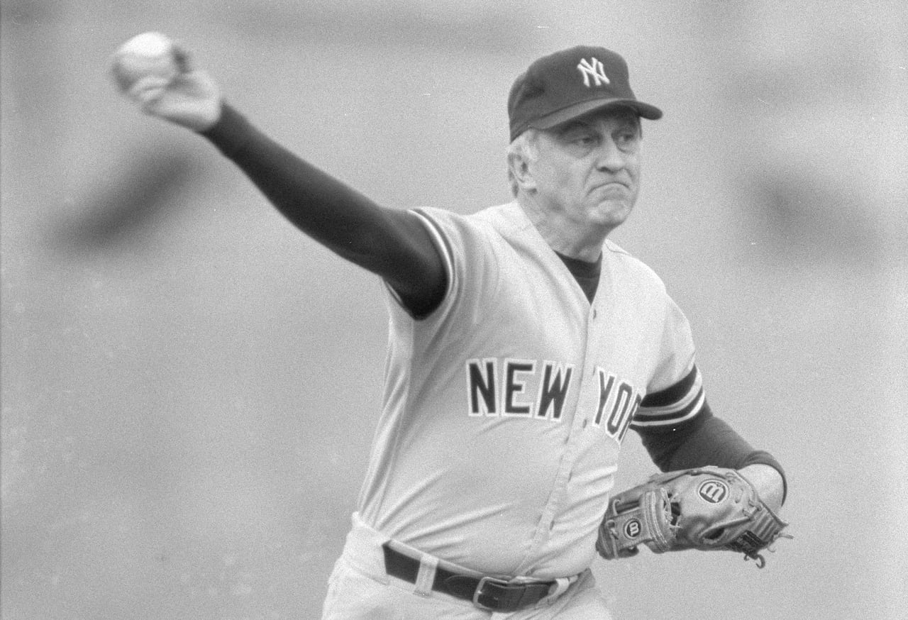 Knuckleball pitcher Phil Niekro throwing a pitch during a 1985 baseball game