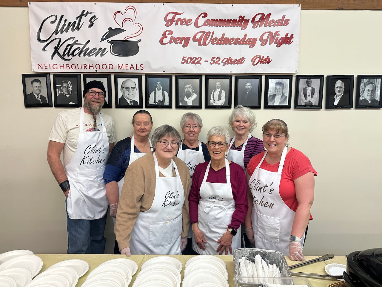 A group of people pose for a photo.