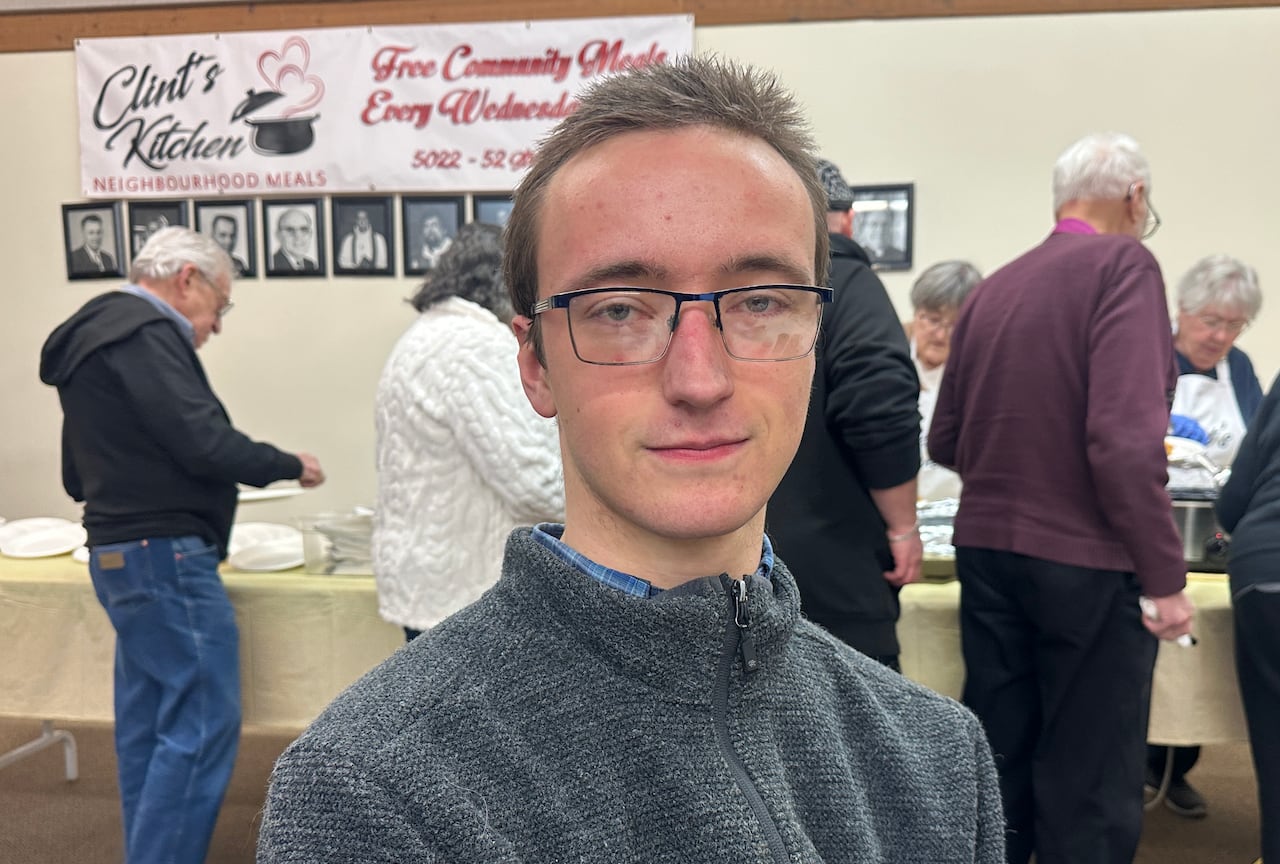 A young person indoors.