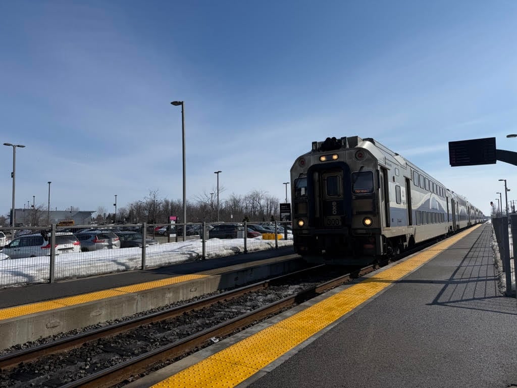 train passes at vaudreuil-dorion train station