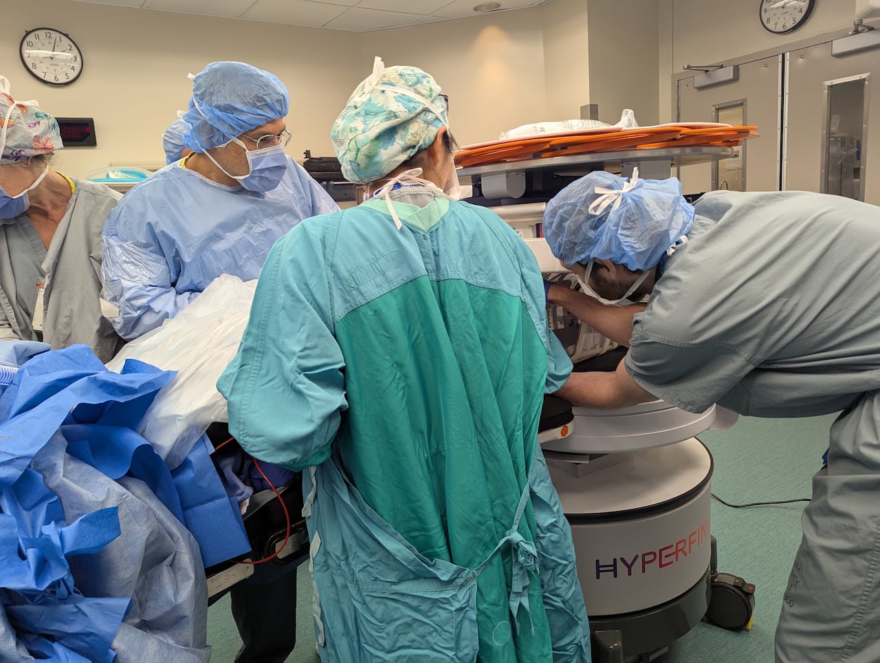 Neurosurgeon Dr. Neil Duggal and other clinicians at the London Health Sciences Centre (LHSC) use a mobile MRI for the first time during a pituitary tumour removal surgery in Oct. 2025. 