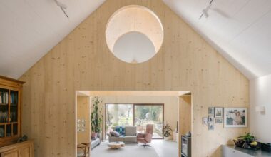 Timber Structures Pull Triple Duty Inside This Belgian Home for a Retired Couple