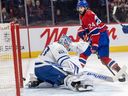 Montreal Canadiens forward Phillip Danault shoots the puck past Toronto Maple Leafs Joseph Woll for a goal during the first period of a National Hockey League game in Montreal on March 10, 2026.