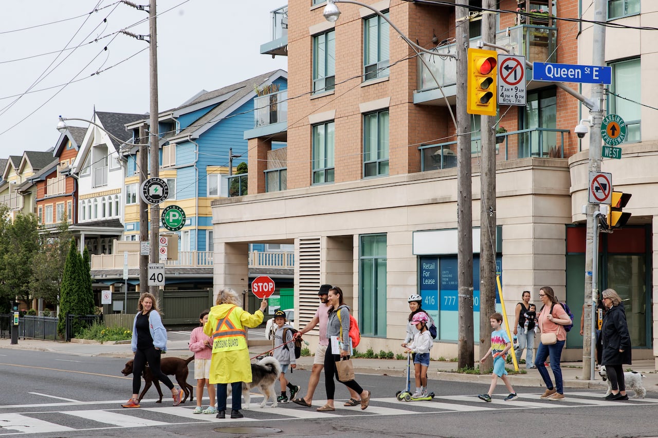 Public school students walk to class on the last day of school, in Toronto, on June 27, 2025.