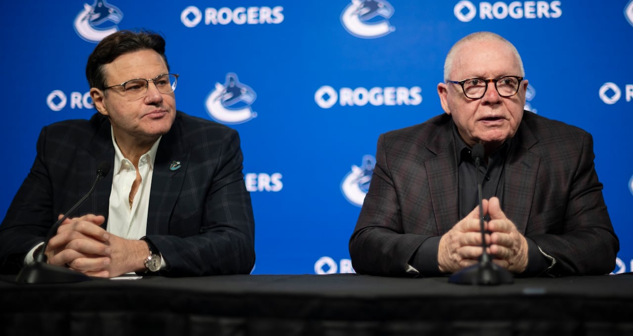 Francesco Aquilini, chairman and governor for Vancouver Canucks, left, and Jim Rutherford, president of hockey operations. 