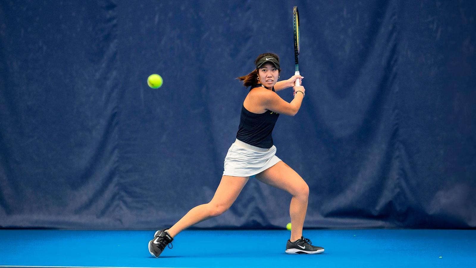 Women's Tennis Sign and Balls Double Exposure