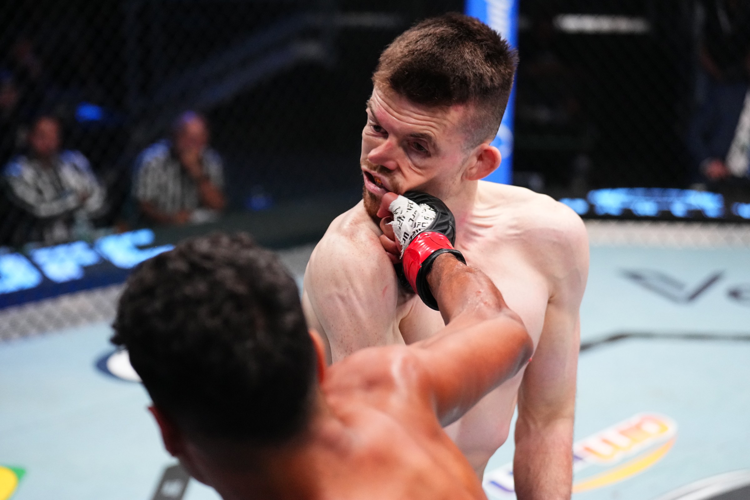 LAS VEGAS, NEVADA - MARCH 14: Marwan Rahiki of Morocco punches Harry Hardwick of England in a featherweight fight during the UFC Fight Night event at Meta APEX on March 14, 2026 in Las Vegas, Nevada. (Photo by Chris Unger/Zuffa LLC)