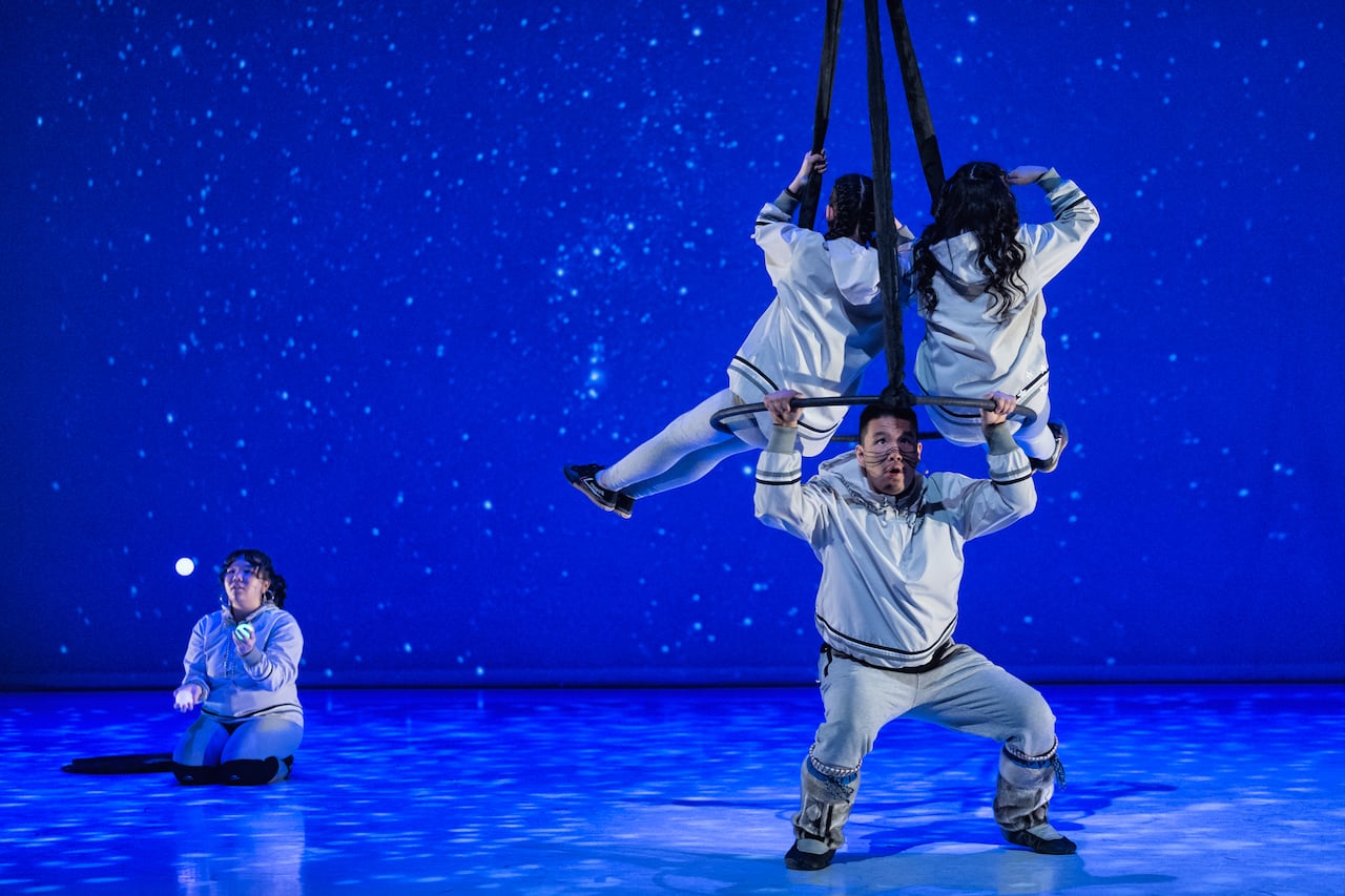 People dressed in white dancing