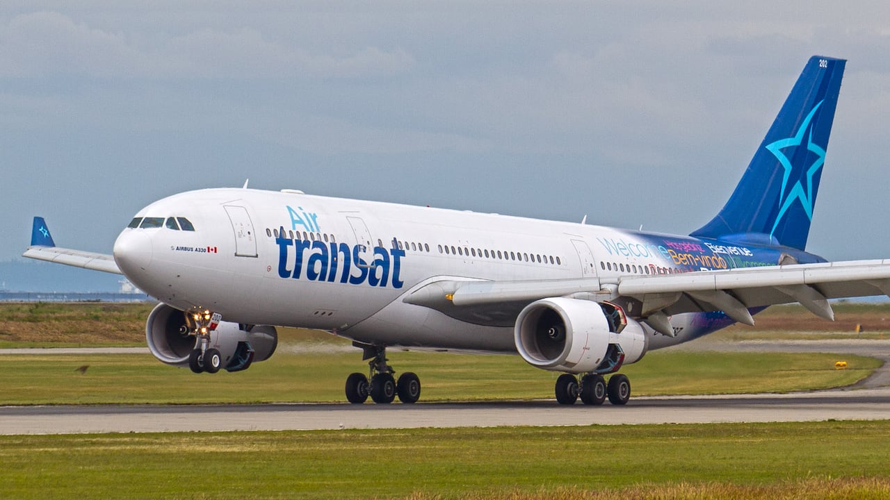 Air Transat Airbus A330 landing on a runway