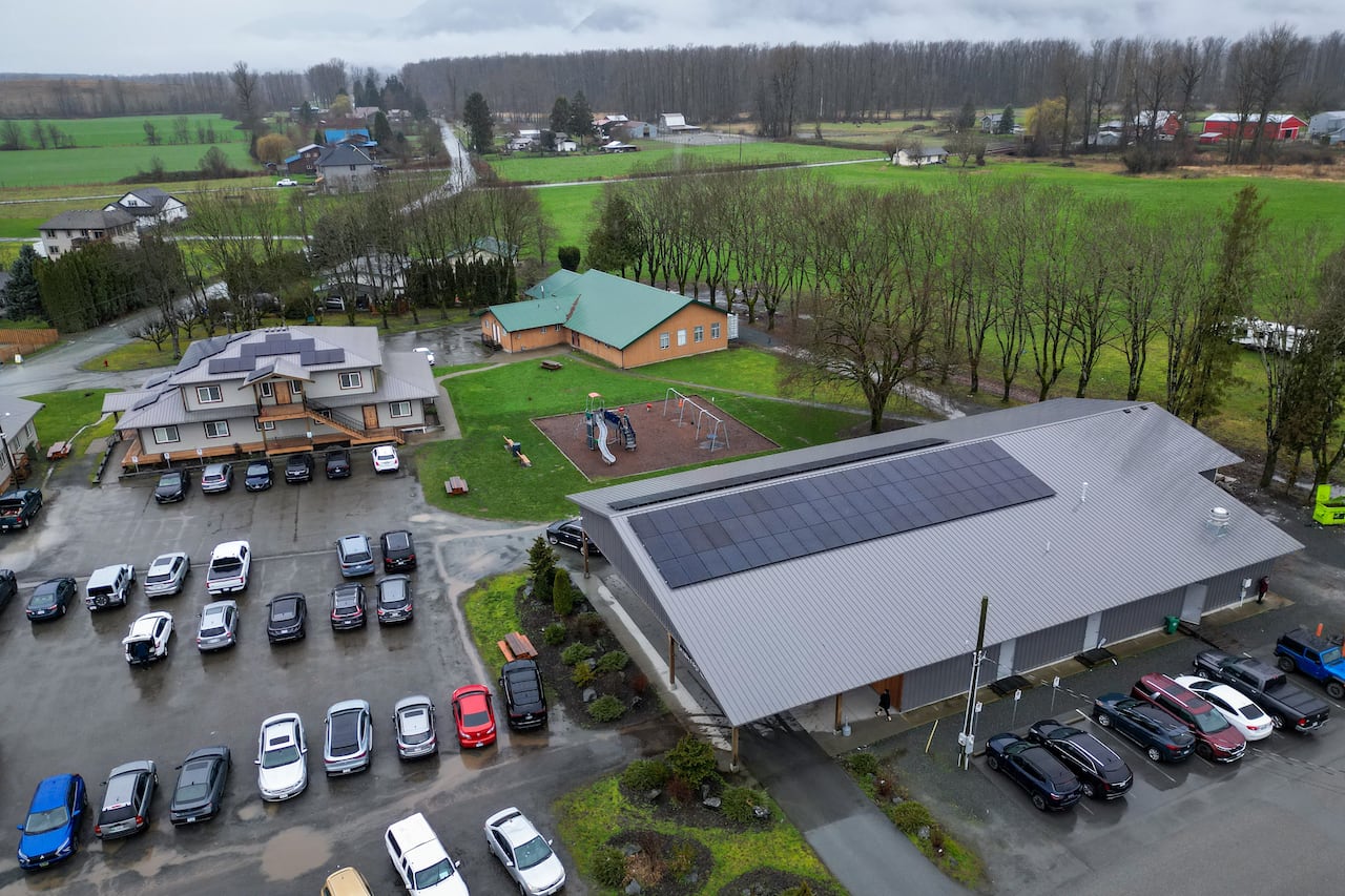 birdseye view of solar panels on roofs