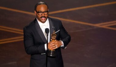 Ryan Coogler holds an oscar