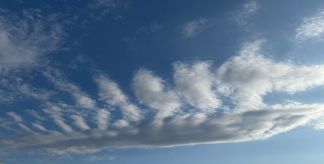 A blue sky full of clouds.