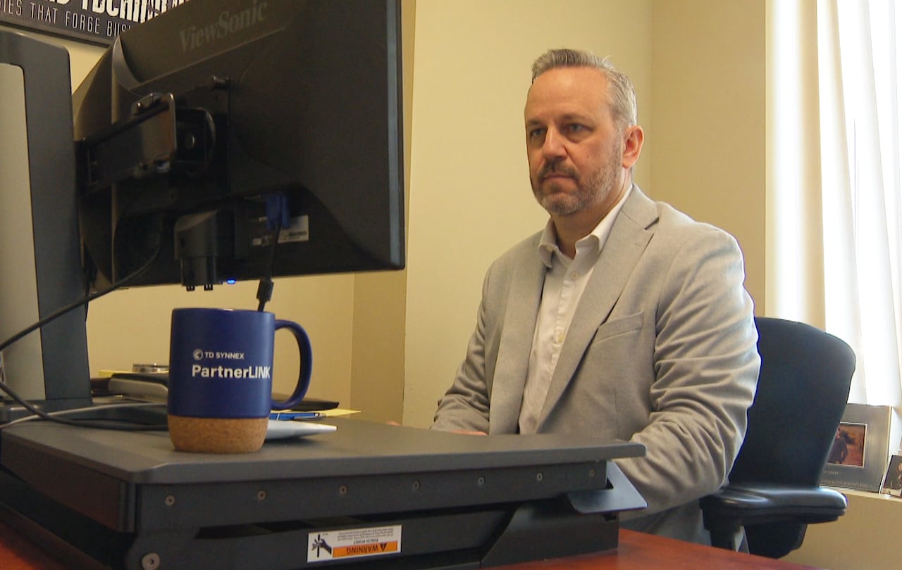 Man sitting at computer desk