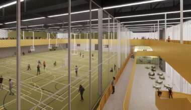 A rendering with a pickleball court on the left with an elevated running track on the right.