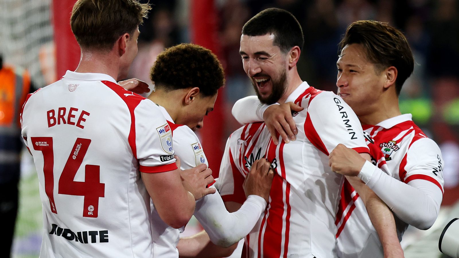 Finn Azaz is congratulated by his team-mates after scoring Southampton's opening goal against Norwich