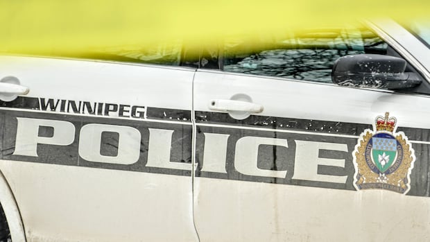 Man's body found in burnt-out car just north of Winnipeg railway yard