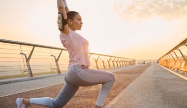 woman stretching before an early morning run