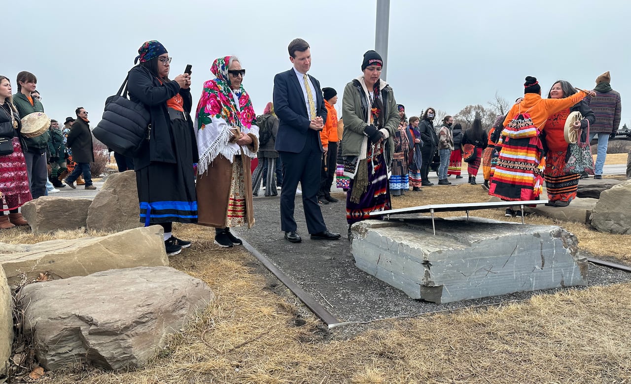 People gather at an outdoor location.