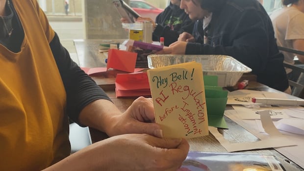 Regina residents protest planned Bell AI data centre through art, music and zines