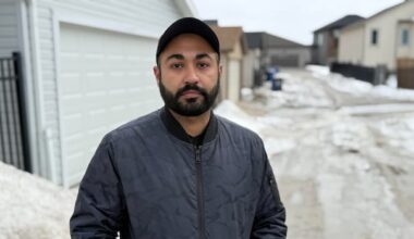 Winnipeg residents chip away at frozen drains to curb spring flooding