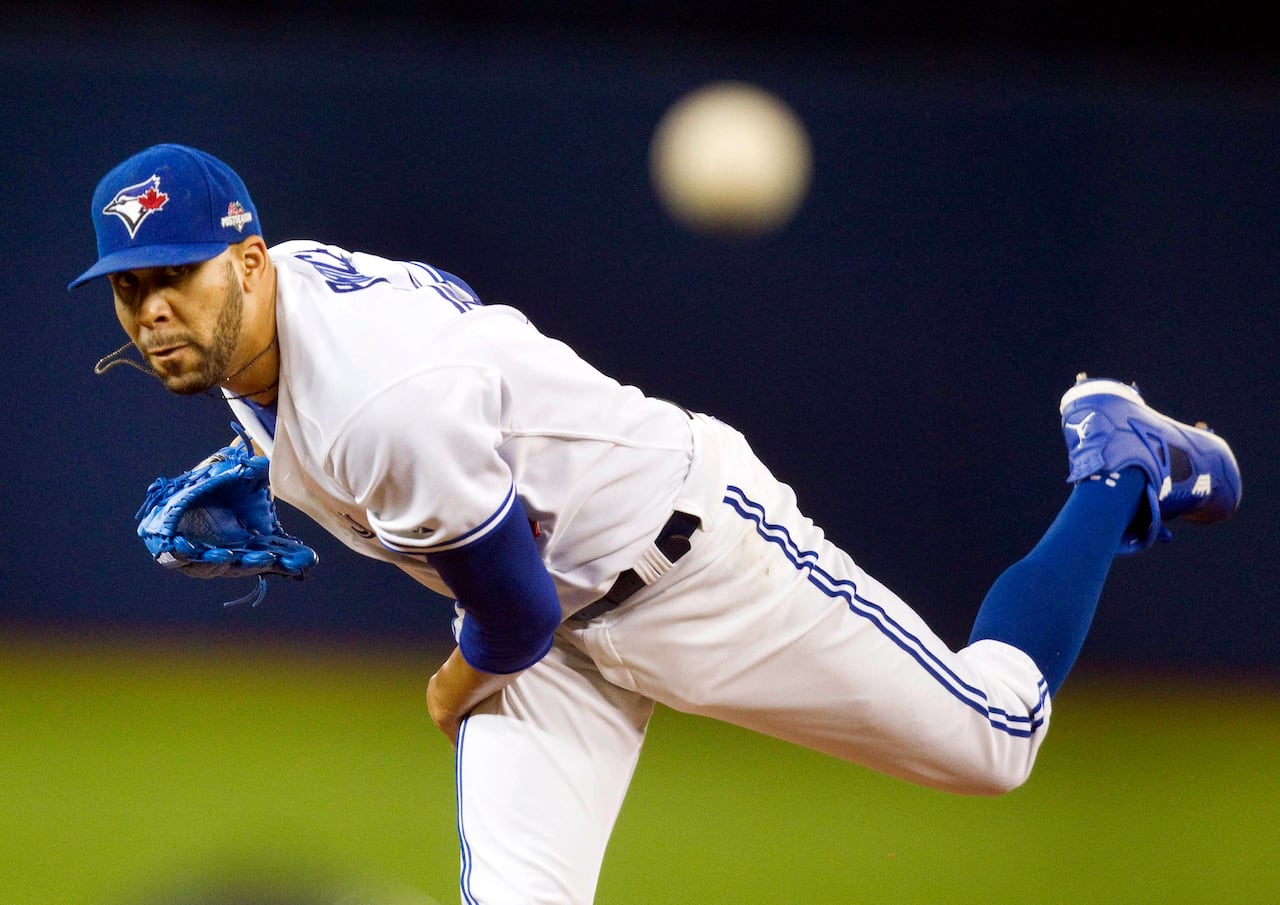 Blue Jays pitcher David Price throwing a pitch toward home plate