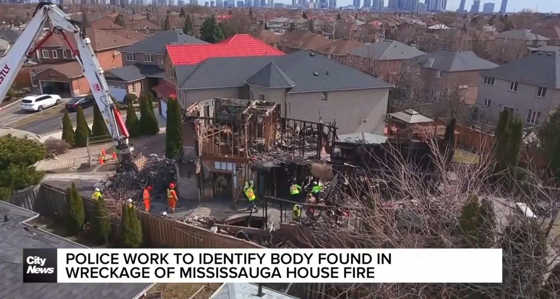 Police work to identify a body found in the wreckage of a Mississauga House explosion