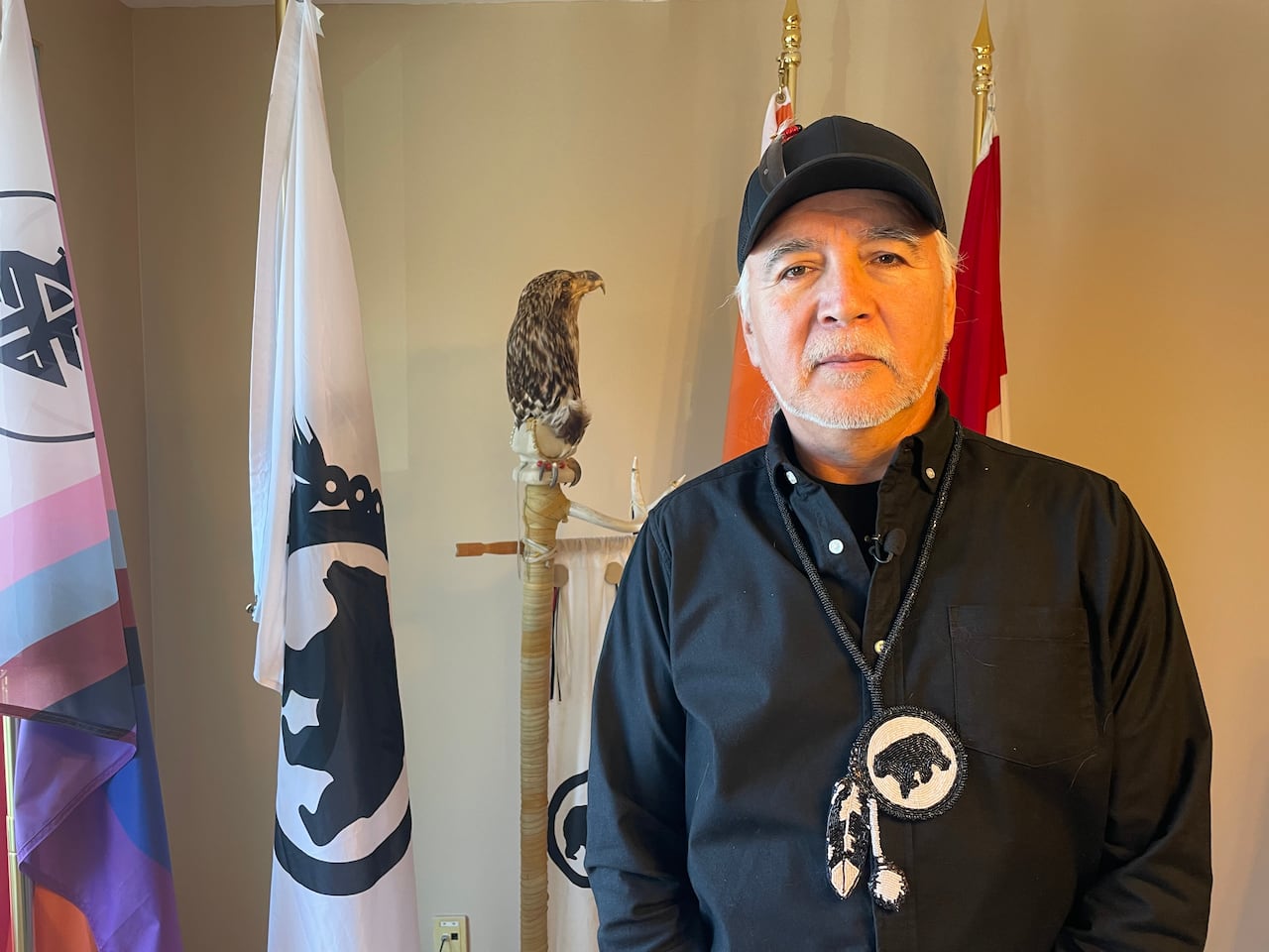 A First Nations chief poses for a photo.