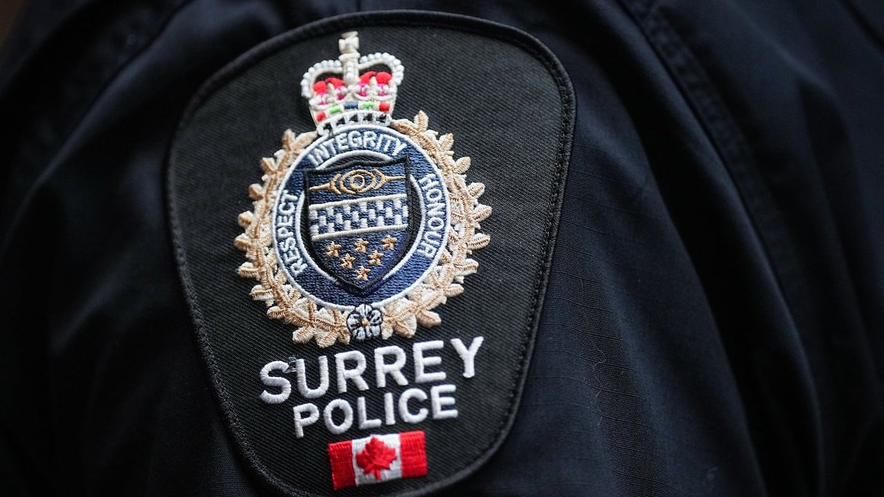 A Surrey Police Service patch is seen on an officer's uniform in Surrey, B.C., on Friday, Nov. 29, 2024.