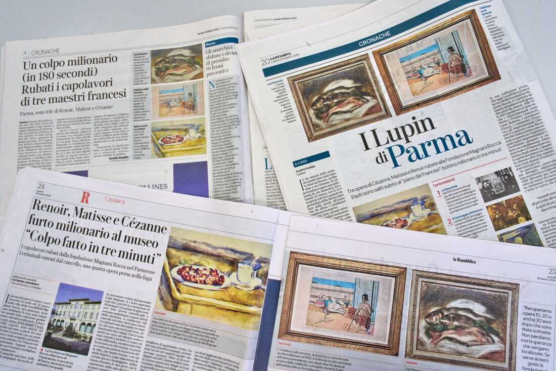 Italian Newspapers carry the news of the heist of three paintings, "Fish" by Auguste Renoir, "Still Life with Cherries" by Paul Cézanne, and "Odalisque on the Terrace" by Henri Matisse, from a museum near Parma, northern Italy, Monday, March 30, 2026.