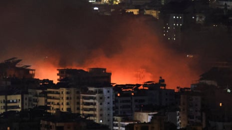 Israel launches strikes in southern Beirut, after ordering mass evacuations – video