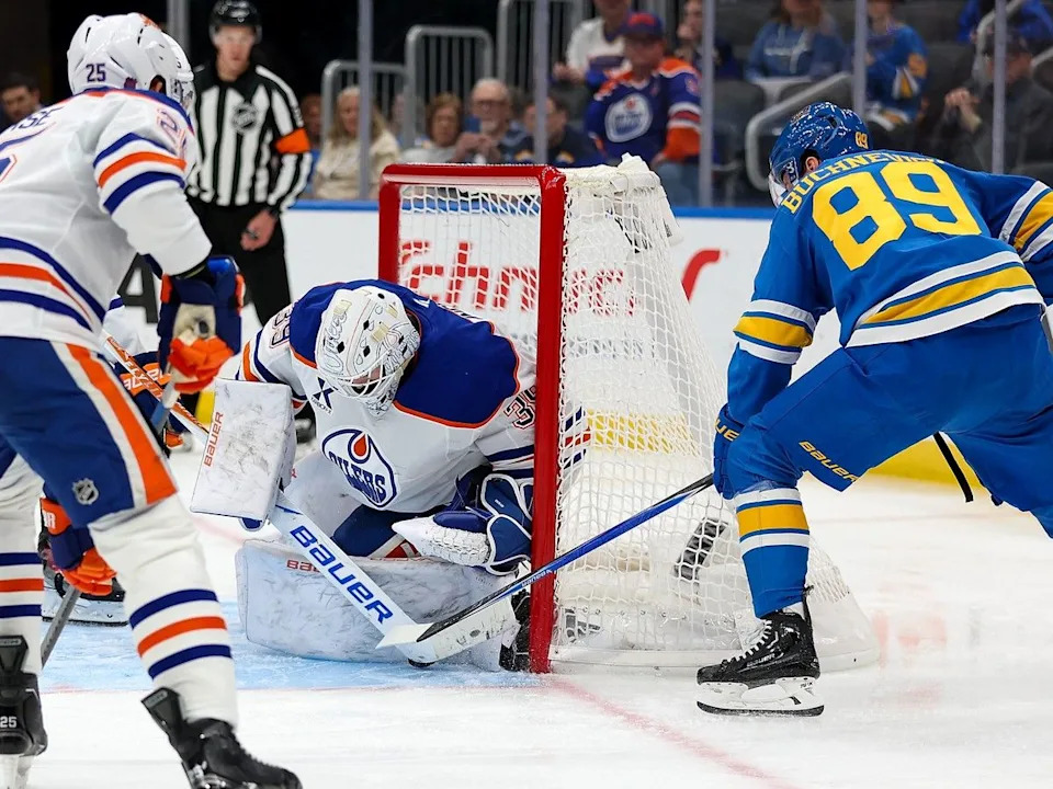 Edmonton Oilers goaltender Connor Ingram (39) stops a shot by St. Louis Blues’ Pavel Buchnevich (89) during the second period of an NHL hockey game Friday, March 13, 2026, in St. Louis.