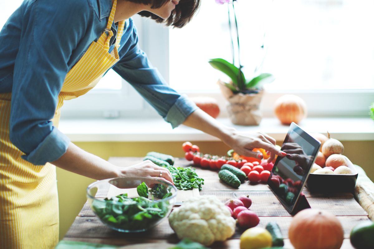 woman preparing vegetables