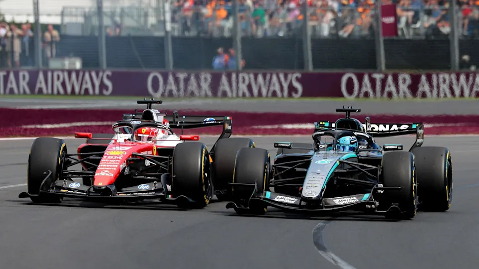 Mercedes' George Russell and Ferrari's Charles Leclerc side by side as they battled for the lead of the Australian Grand Prix