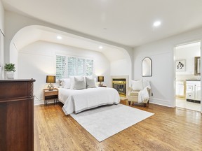 The primary bedroom has a gas fireplace and a four-piece ensuite bathroom.