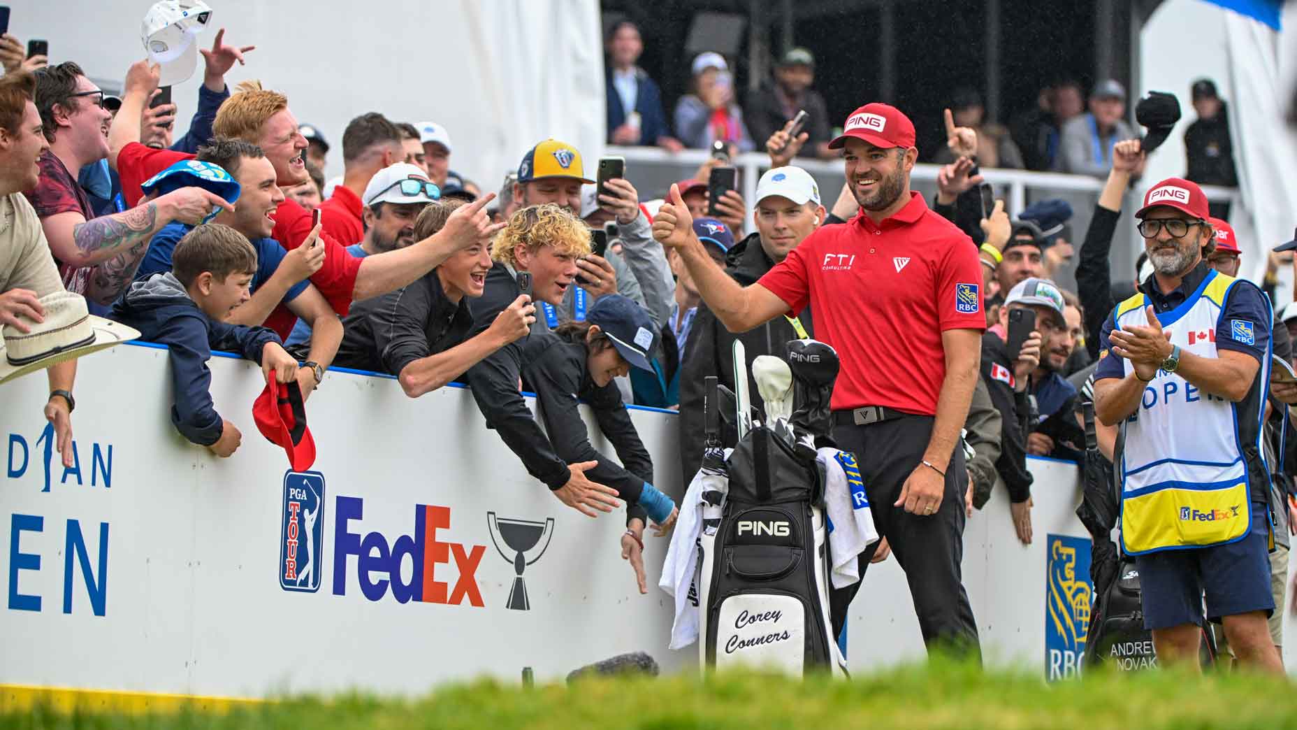 PGA Tour pro Corey Conners reacts to fans during the final round of the RBC Canadian Open.