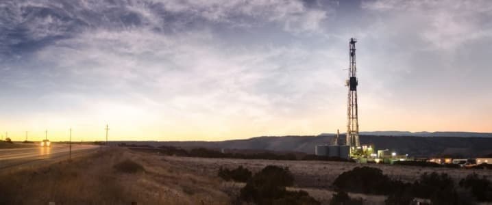 US shale rig at sunset