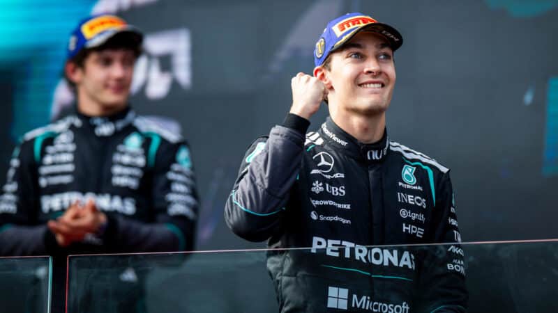George Russell and Kimi Antonelli (both Mercedes) on the podium after the 2026 Australian Grand Prix in Albert Park