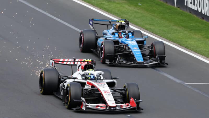 Sparks fly as Oliver Bearman (Haas-Ferrari) passes Carlos Sainz Jr (Williams-Mercedes) in the 2026 Australian Grand Prix