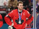 Silver medallist Connor McDavid of Team Canada looks on during the medal ceremony after an overtime loss to the U.S. in the gold-medal game at the 2026 Winter Olympic Games at the Milano Santagiulia Ice Hockey Arena on Feb. 22, 2026 in Milan, Italy.