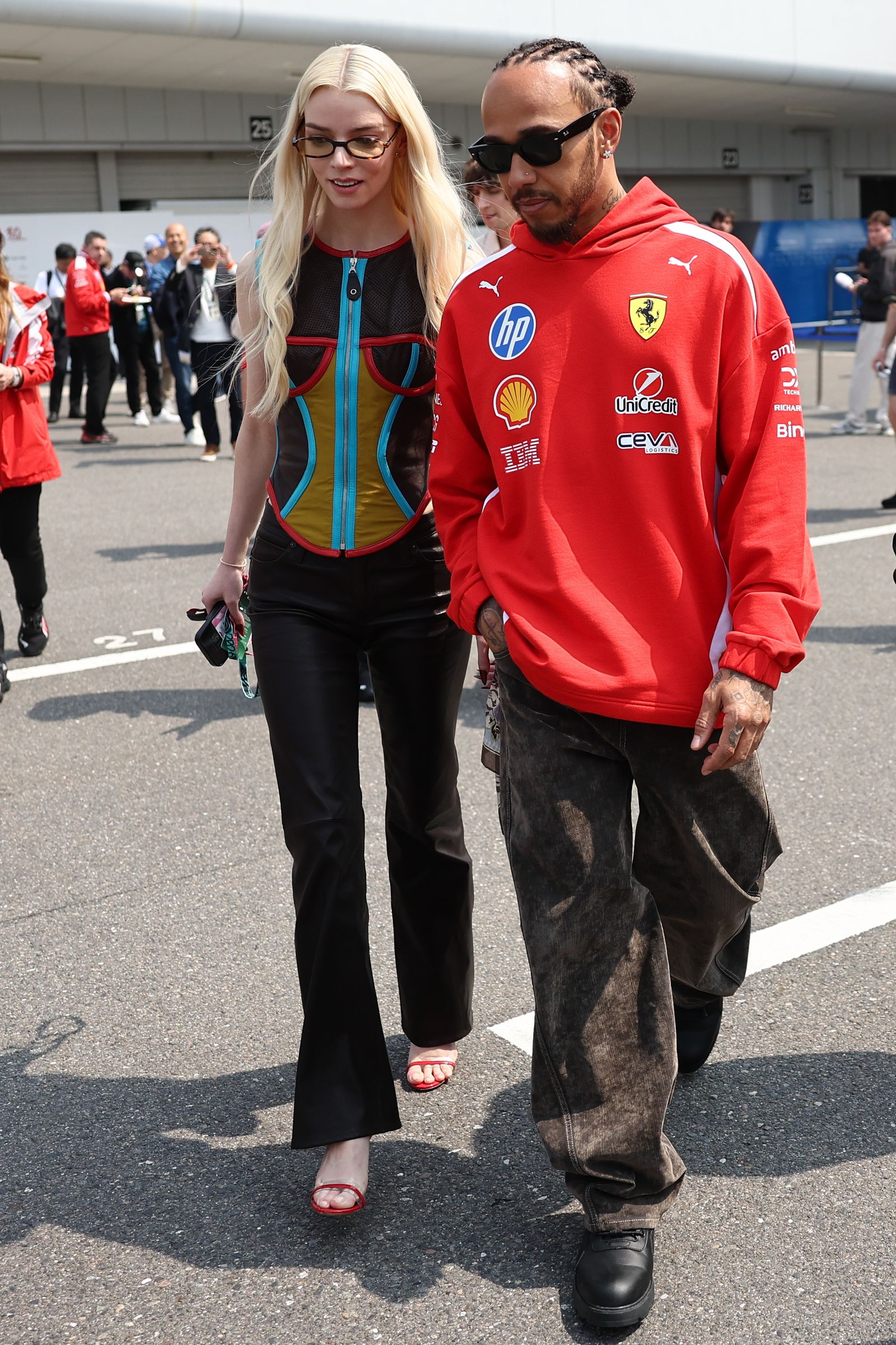 Anya TaylorJoy and Lewis Hamilton of Ferrari ahead of the Formula 1 Japanese Grand Prix at Suzuka Circuit in Suzuka...