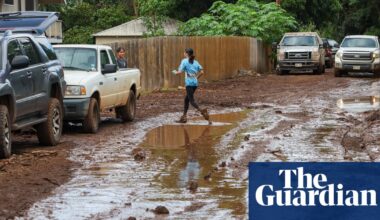 Red volcanic mud coats homes after Hawaii’s worst floods in 20 years | Hawaii