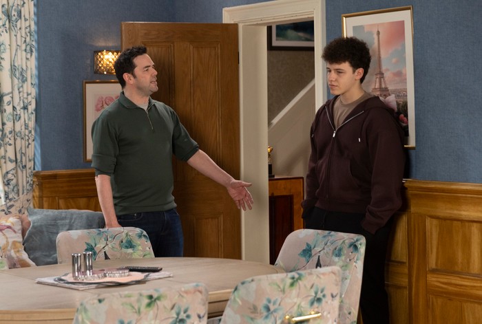 25_03_coro_ben_will_01 Ben stands beside Will in a scene from Coronation Street