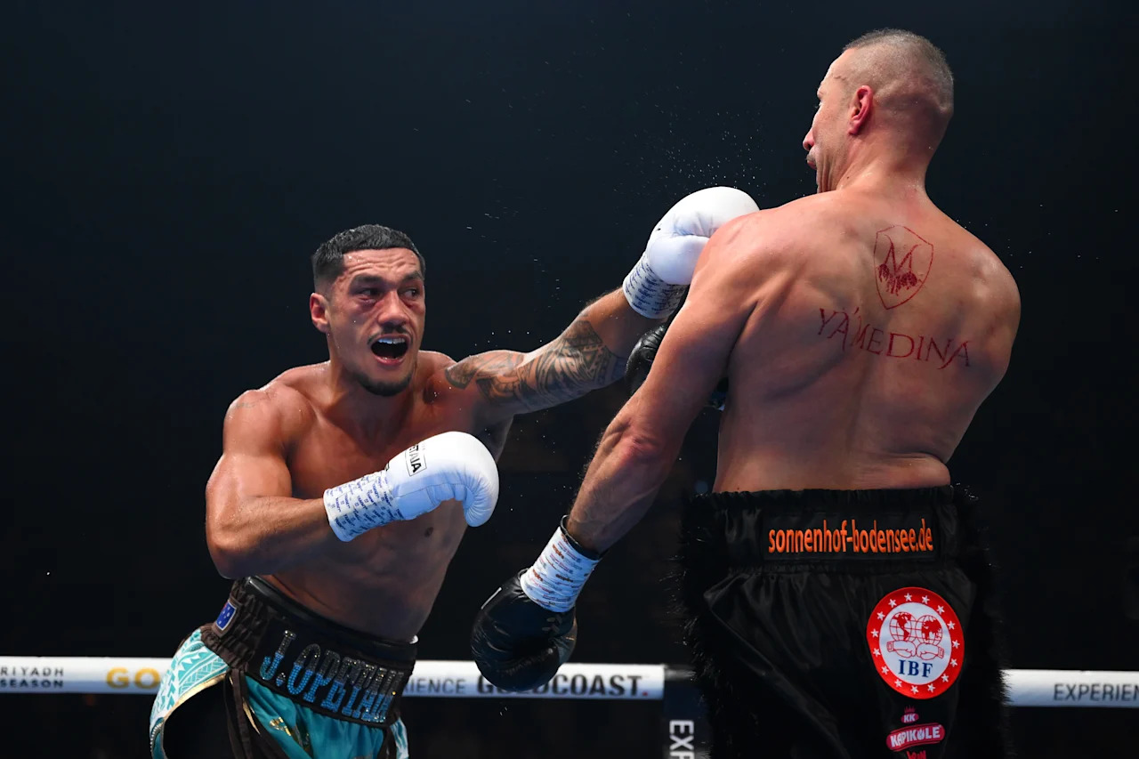 GOLD COAST, AUSTRALIA - DECEMBER 06: Jai Opetaia punches Huseyin Cinkara​ during the IBF & Ring Magazine Cruiserweight World Title bout between Jai Opetaia and Huseyin Cinkara at Gold Coast Convention and Exhibition Centre on December 06, 2025 in Gold Coast, Australia. (Photo by Matt Roberts/Getty Images)